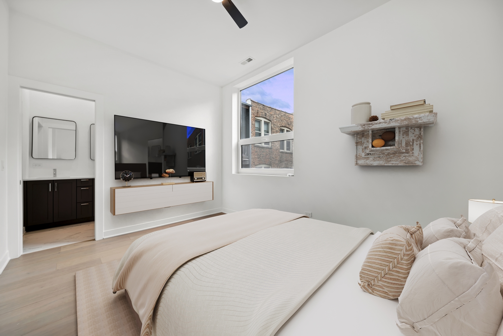 1333 East Madison Park Chicago, IL 60615 - Photo 21 of 32 a bedroom with a bed and a television