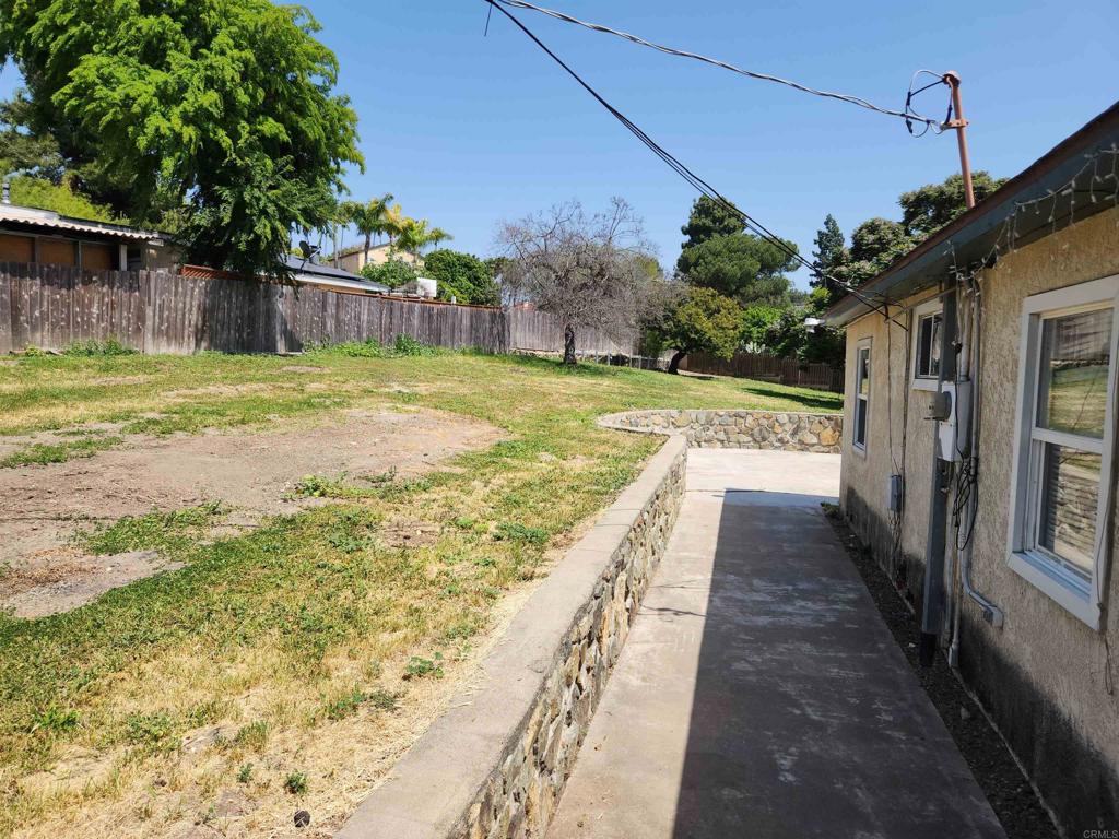 3525 Calavo Drive Spring Valley, CA 91978 - Photo 18 of 21 a view of a house with backyard and tree