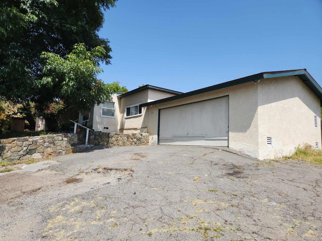 3525 Calavo Drive Spring Valley, CA 91978 - Photo 21 of 21 a front view of a house with a yard