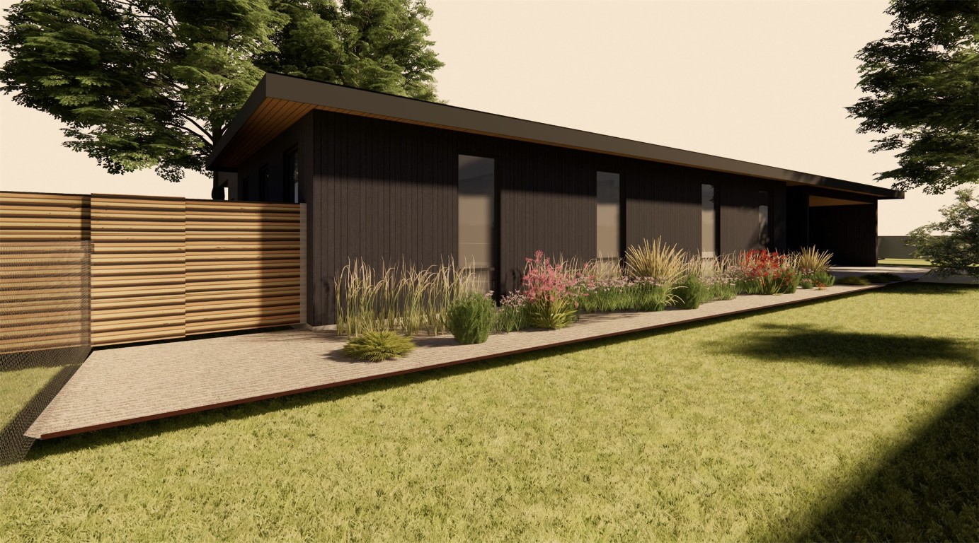 a view of house with backyard and sitting area