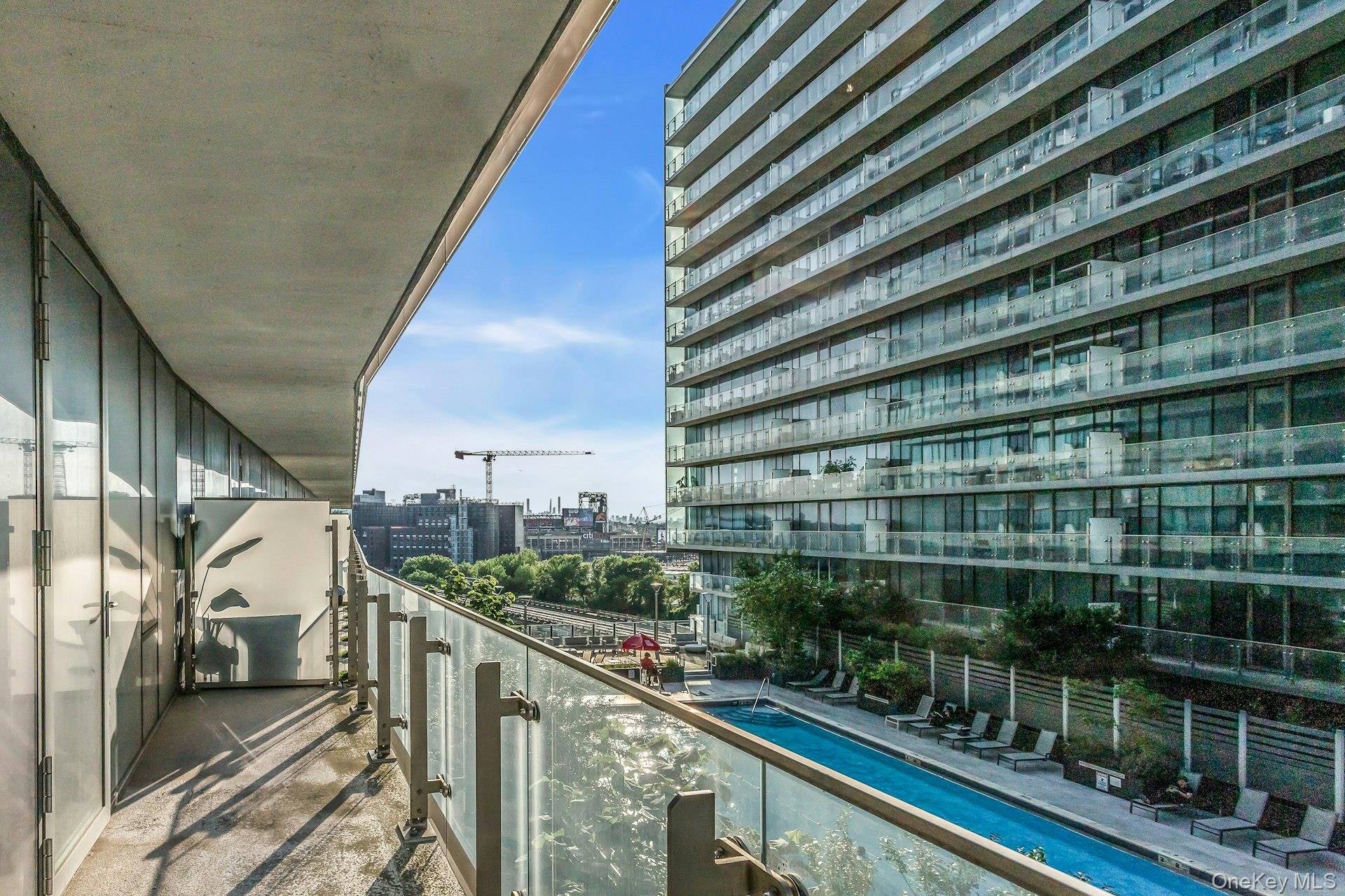 131-03 40 Road, Unit 10E Queens, NY 11354 - Photo 3 of 15 Balcony featuring a view of city