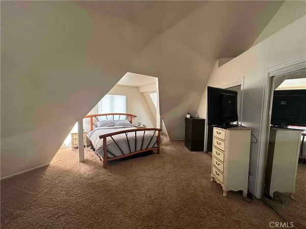 a living room with a couch and a flat screen tv