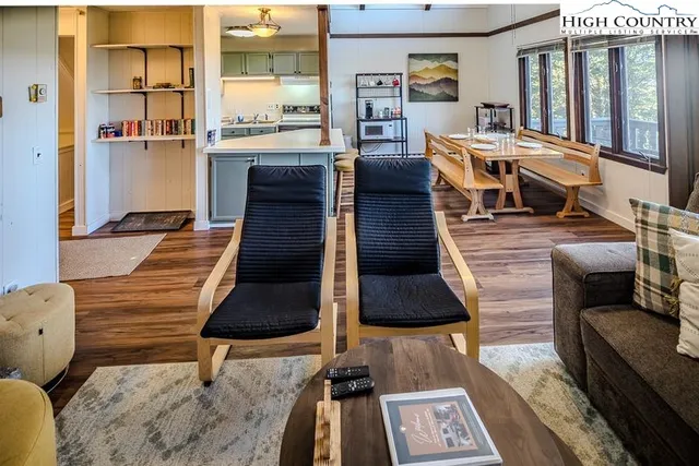 a living room with furniture and a table