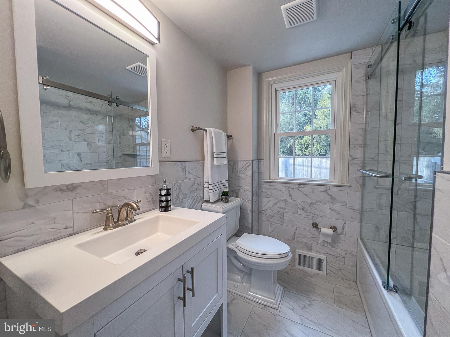 429 Conestoga Road Wayne, PA 19087 - Photo 17 of 33 a bathroom with a sink toilet and shower