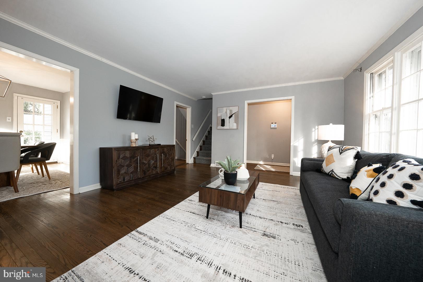 429 Conestoga Road Wayne, PA 19087 - Photo 5 of 33 a living room with furniture and a flat screen tv
