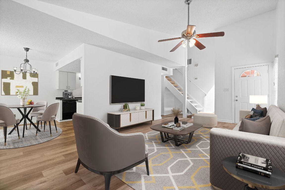 8902 Trone Circle, Unit A Austin, TX 78758 - Photo 1 of 1 a living room with furniture and a flat screen tv