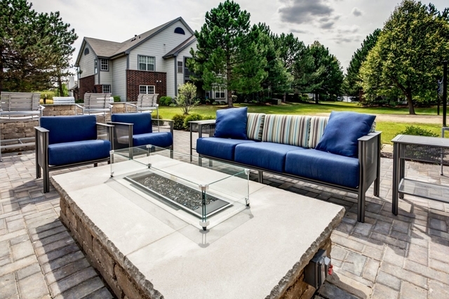 8 Sterling Circle, Unit 104 Wheaton, IL 60189 - Photo 31 of 36 a view of a terrace with couches and pool