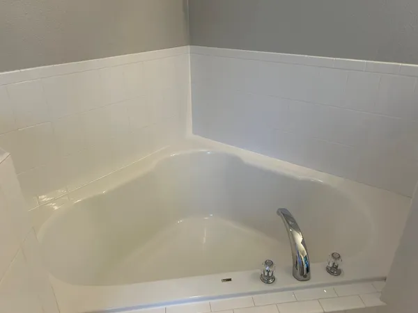 a close up of a bathtub
