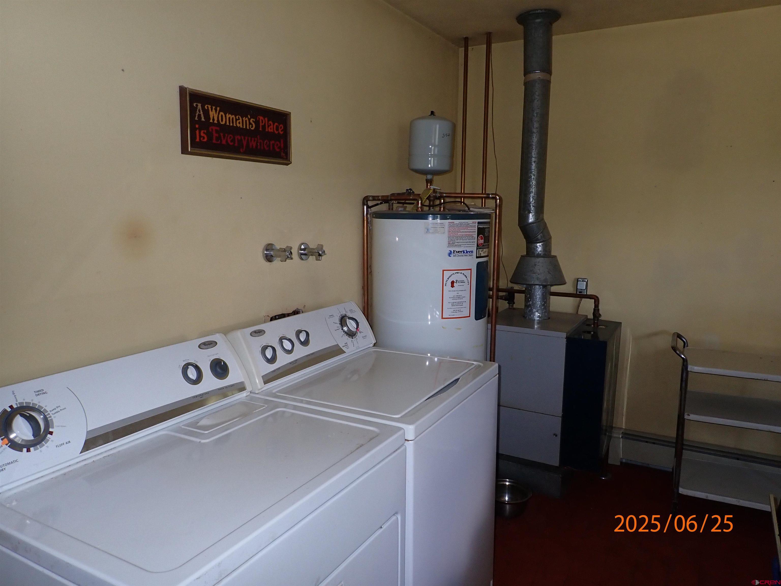 21391 Kaiser Road Austin, CO 81410 - Photo 4 of 12 a utility room with dryer and washer