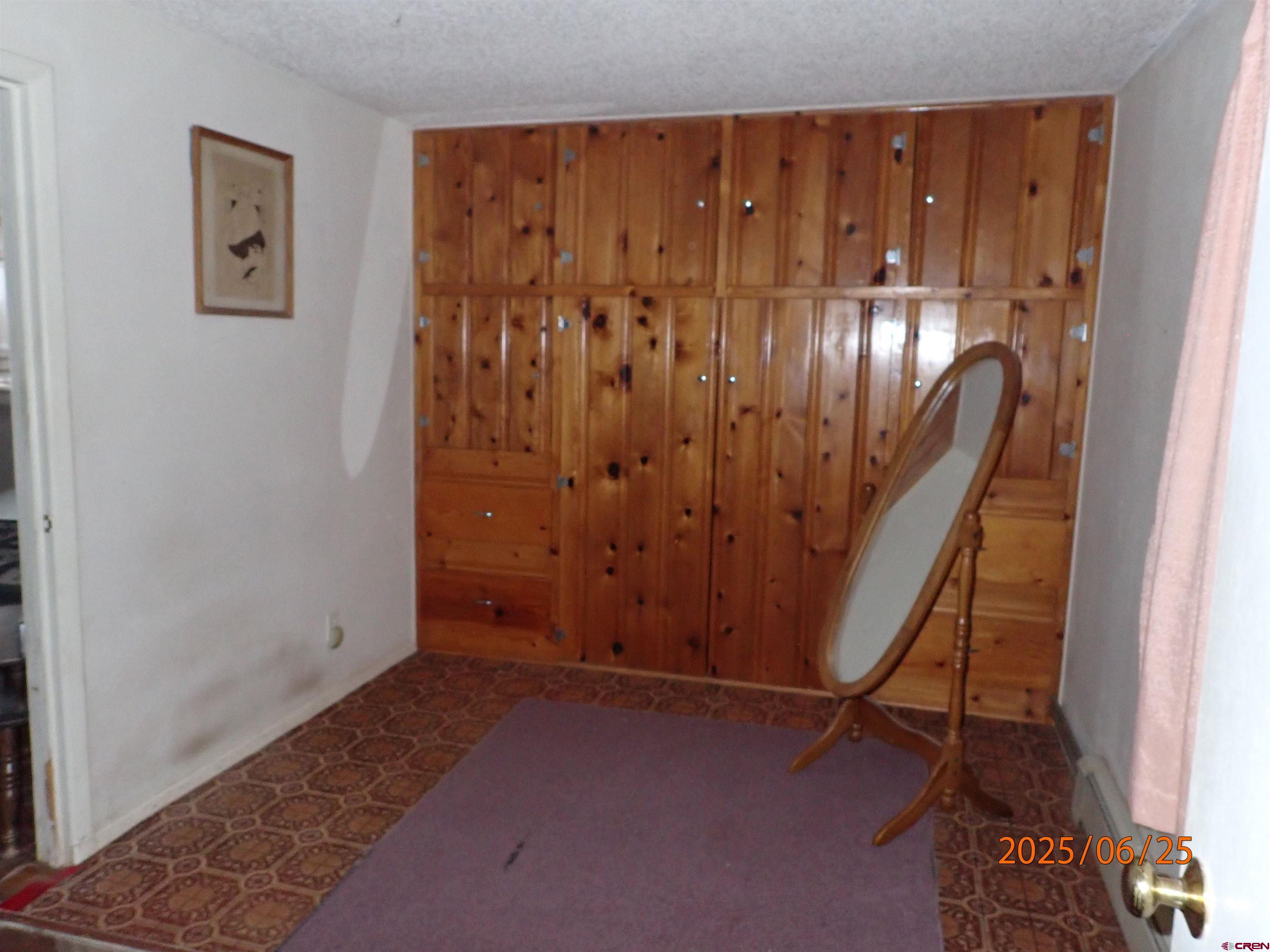 21391 Kaiser Road Austin, CO 81410 - Photo 8 of 12 a view of an entryway with wooden floor