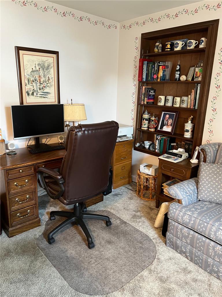 6830 Gun Club Road Coopersburg, PA 18036 - Photo 23 of 30 An inviting study with built-in bookshelves and comfortable seating for work or relaxation.