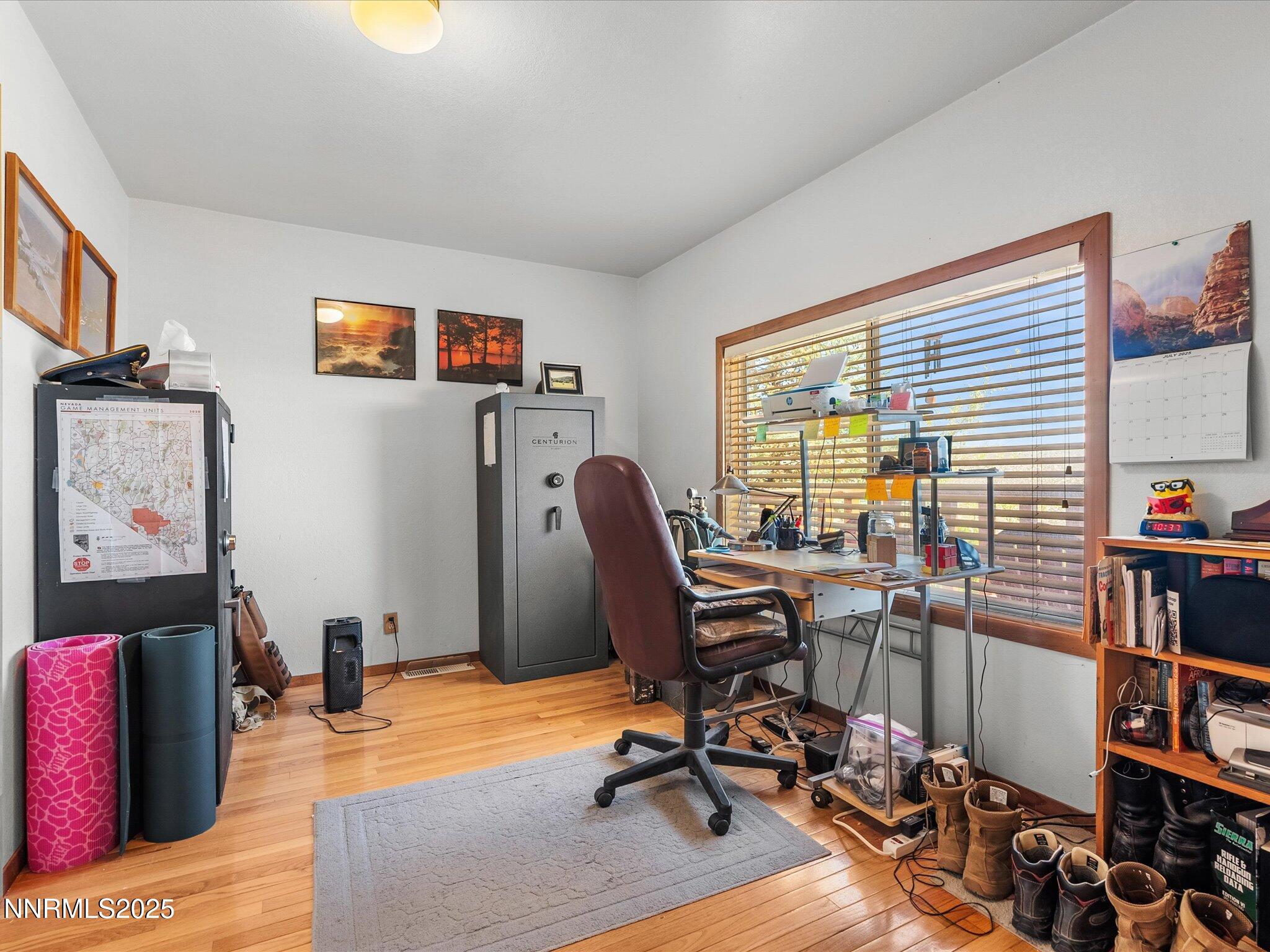 1 Cory Canyon Road Hawthorne, NV 89415 - Photo 26 of 77 a view of a workspace with furniture and a window