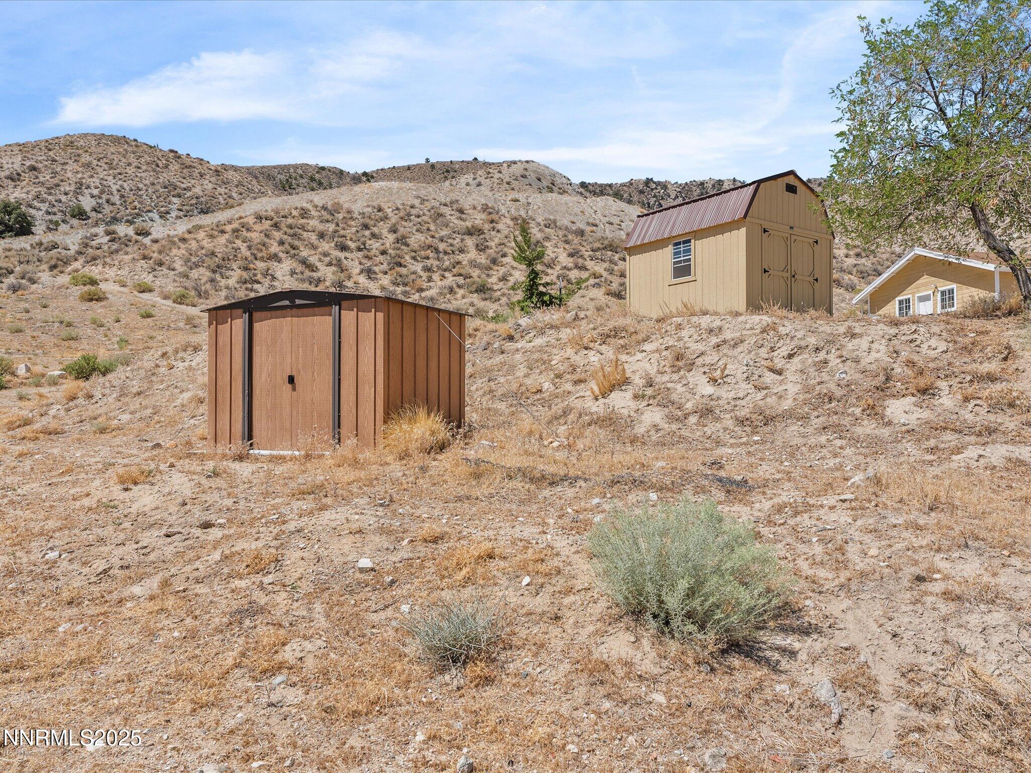 1 Cory Canyon Road Hawthorne, NV 89415 - Photo 40 of 77 a view of a house with a snow in the yard