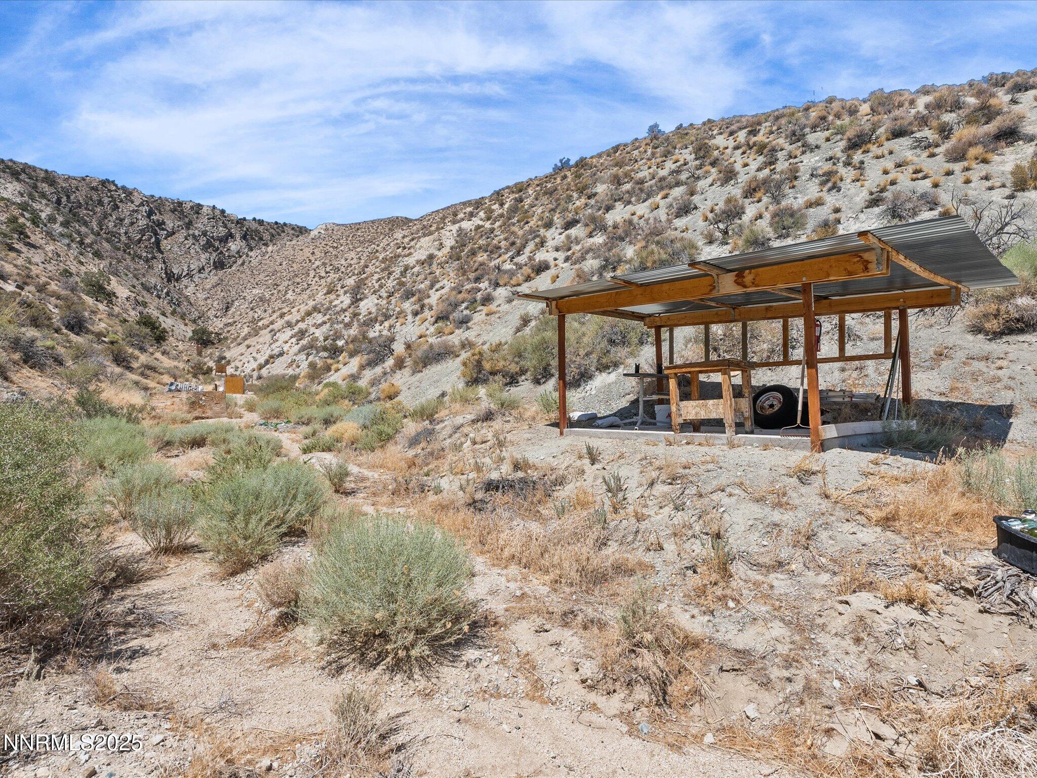 1 Cory Canyon Road Hawthorne, NV 89415 - Photo 44 of 77 a view of a backyard of the house