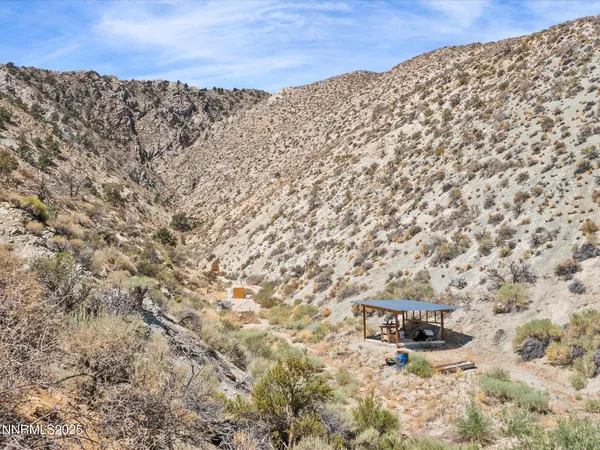 a view of beach and an ocean