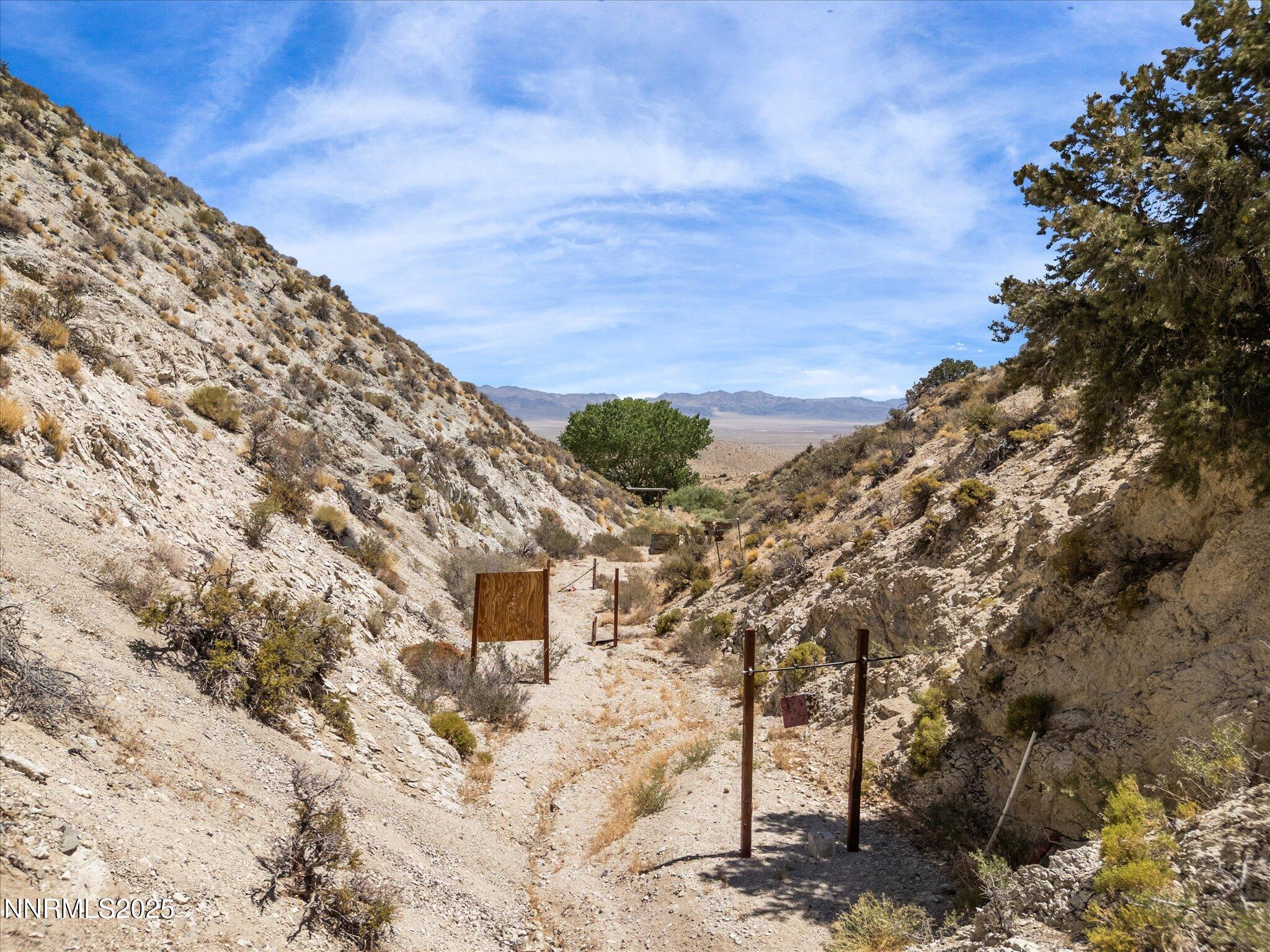 1 Cory Canyon Road Hawthorne, NV 89415 - Photo 47 of 77 a view of a dry yard with wooden fence