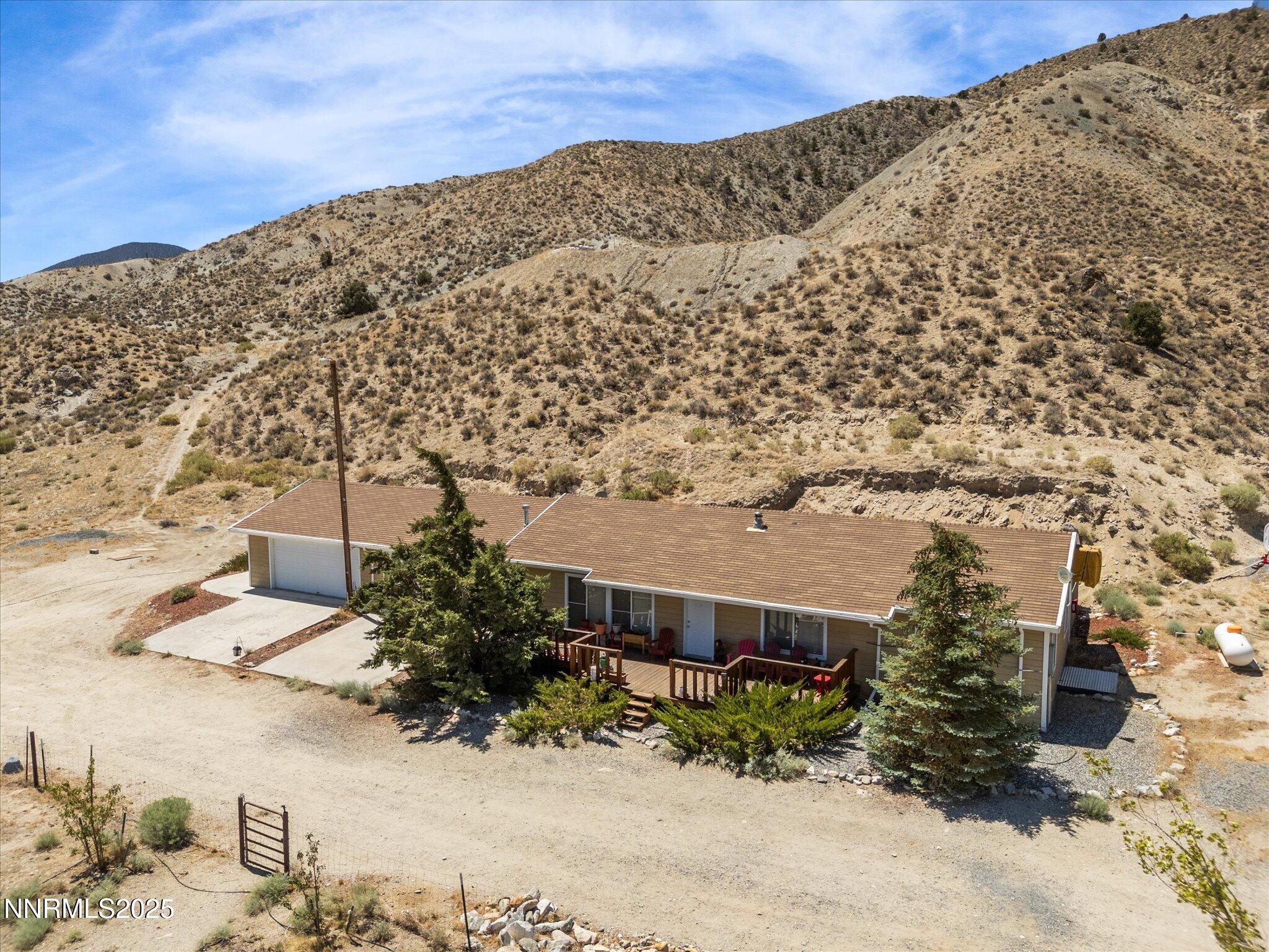 1 Cory Canyon Road Hawthorne, NV 89415 - Photo 51 of 77 a view of a large building with a mountain in the background