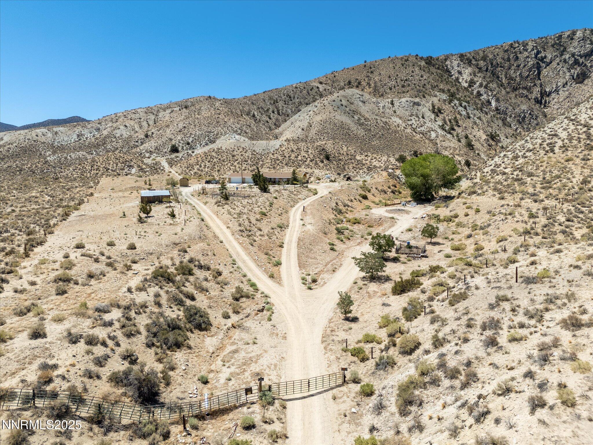 1 Cory Canyon Road Hawthorne, NV 89415 - Photo 58 of 77 a view of a dry field with mountains in the background