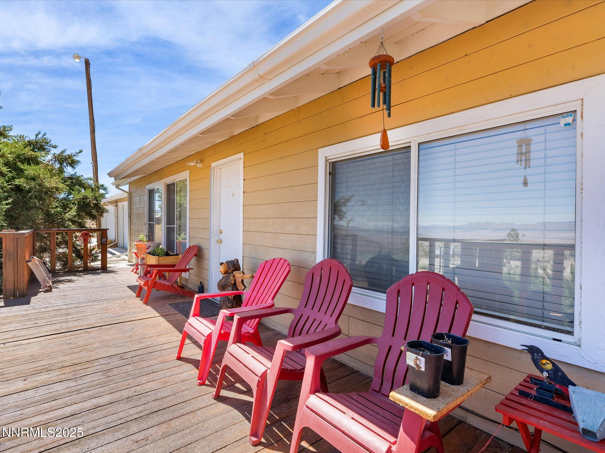 1 Cory Canyon Road Hawthorne, NV 89415 - Photo 7 of 77 a view of balcony with wooden floor and outdoor seating