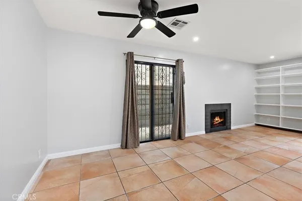 $590,000 | 5921 Templeton Street, Unit G, Huntington Park, CA 90255