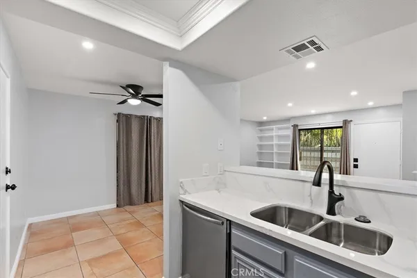$590,000 | 5921 Templeton Street, Unit G, Huntington Park, CA 90255