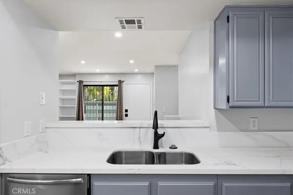 $590,000 | 5921 Templeton Street, Unit G, Huntington Park, CA 90255
