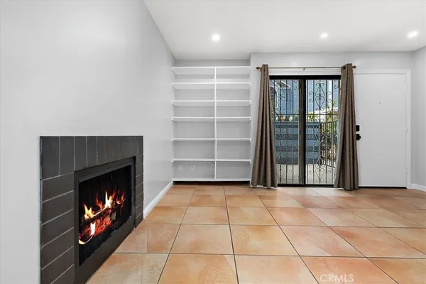 $590,000 | 5921 Templeton Street, Unit G, Huntington Park, CA 90255