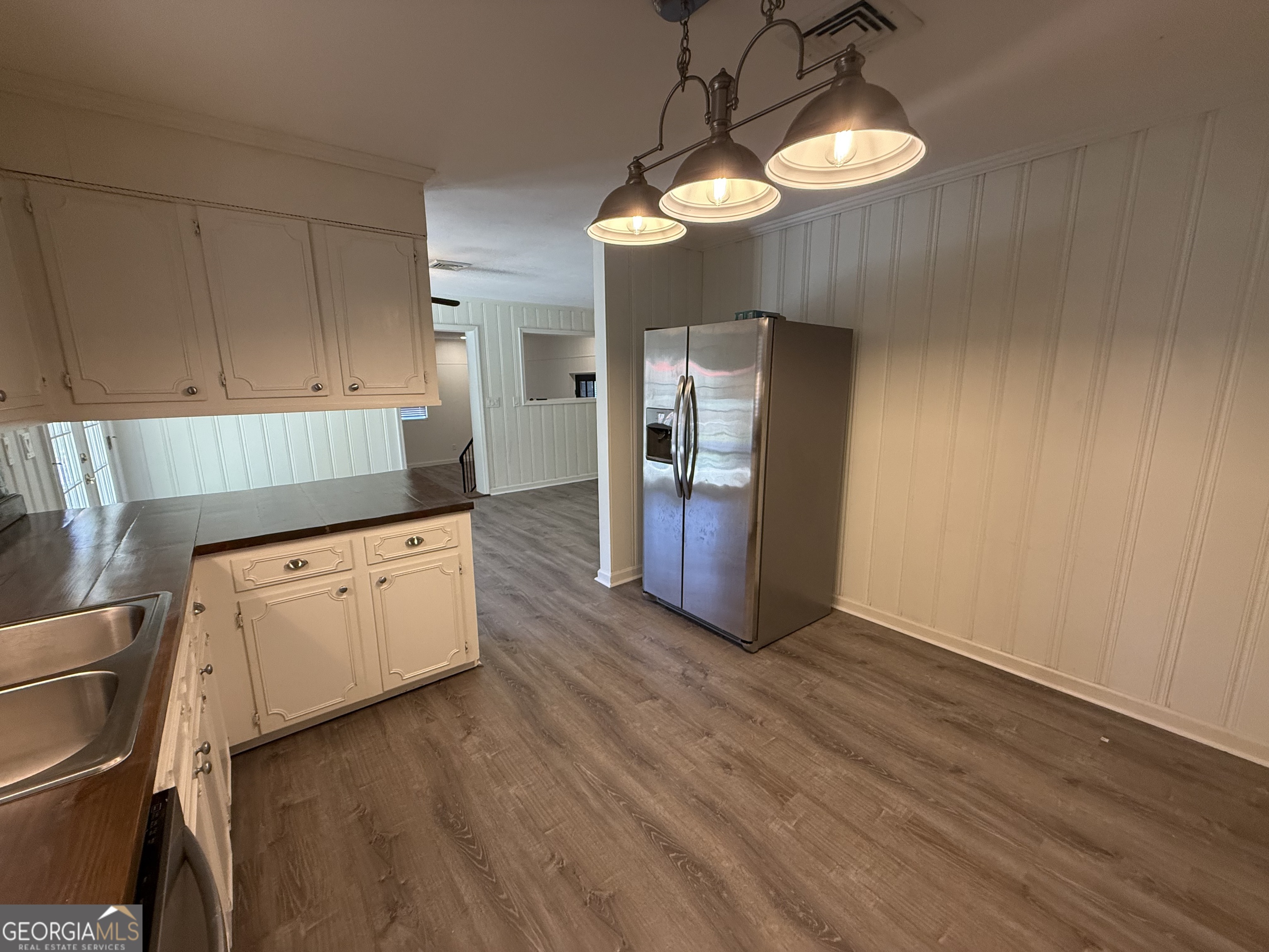 108 Plum Street Dublin, GA 31021 - Photo 23 of 33 a kitchen with stove and cabinets