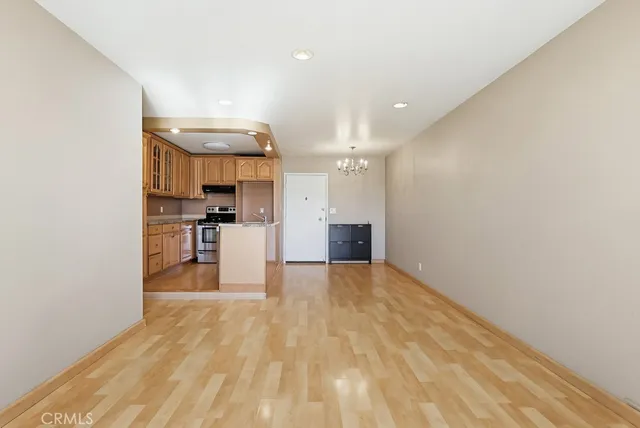 a view of kitchen with cabinets and stainless steel appliances