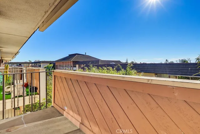a view of a swimming pool with a yard