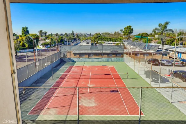 a dining room with furniture and a flat screen tv