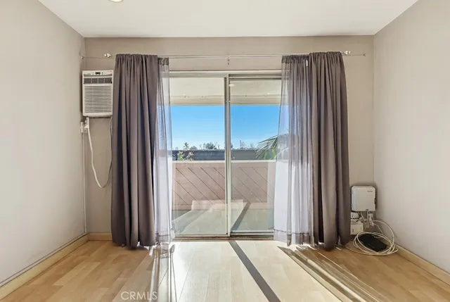 a view of a bathroom with a glass door