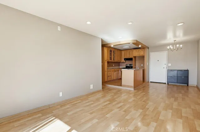 a view of a kitchen with a sink and an oven