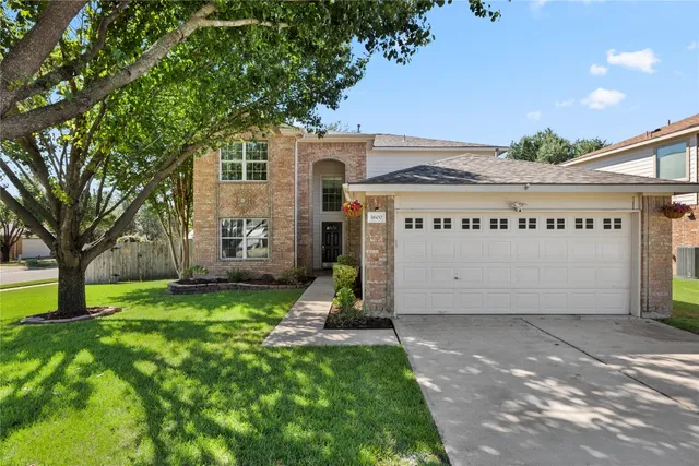 a bathroom with a shower and a toilet