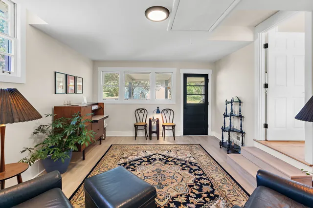a living room with furniture and a couch