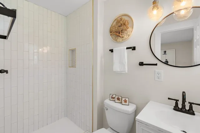 a bathroom with a toilet and a sink