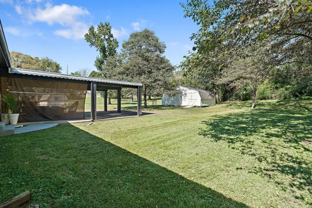 a view of a backyard with a garden