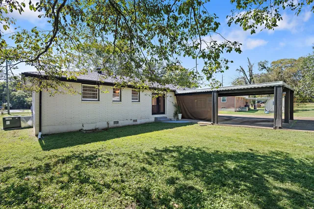 a house view with a garden space
