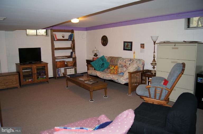 1002 Litchfield Road Baltimore, MD 21239 - Photo 1 of 30 Family Room in lower level.