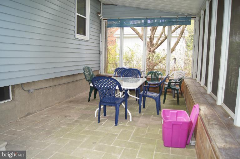 1002 Litchfield Road Baltimore, MD 21239 - Photo 16 of 30 Rear screened porch again.