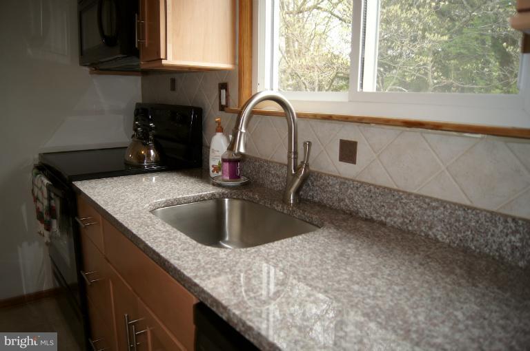 1002 Litchfield Road Baltimore, MD 21239 - Photo 17 of 30 Granite counters, stainless sink.