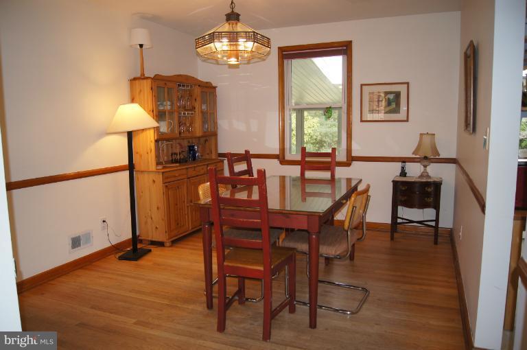 1002 Litchfield Road Baltimore, MD 21239 - Photo 18 of 30 Dining Room with chair rail