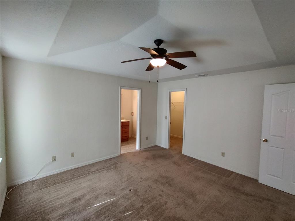 6202 Southwest 100th Loop Ocala, FL 34476 - Photo 16 of 24 a view of empty room with ceiling fan