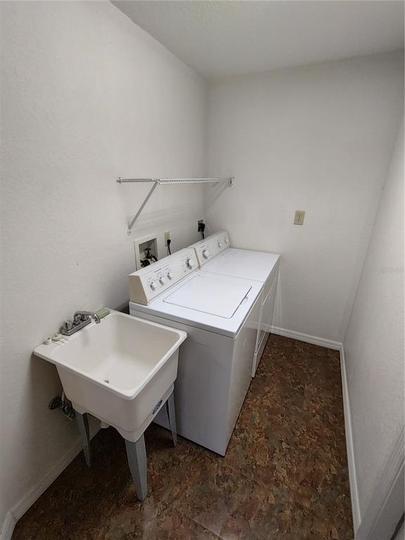 6202 Southwest 100th Loop Ocala, FL 34476 - Photo 19 of 24 a utility room with dryer and washer