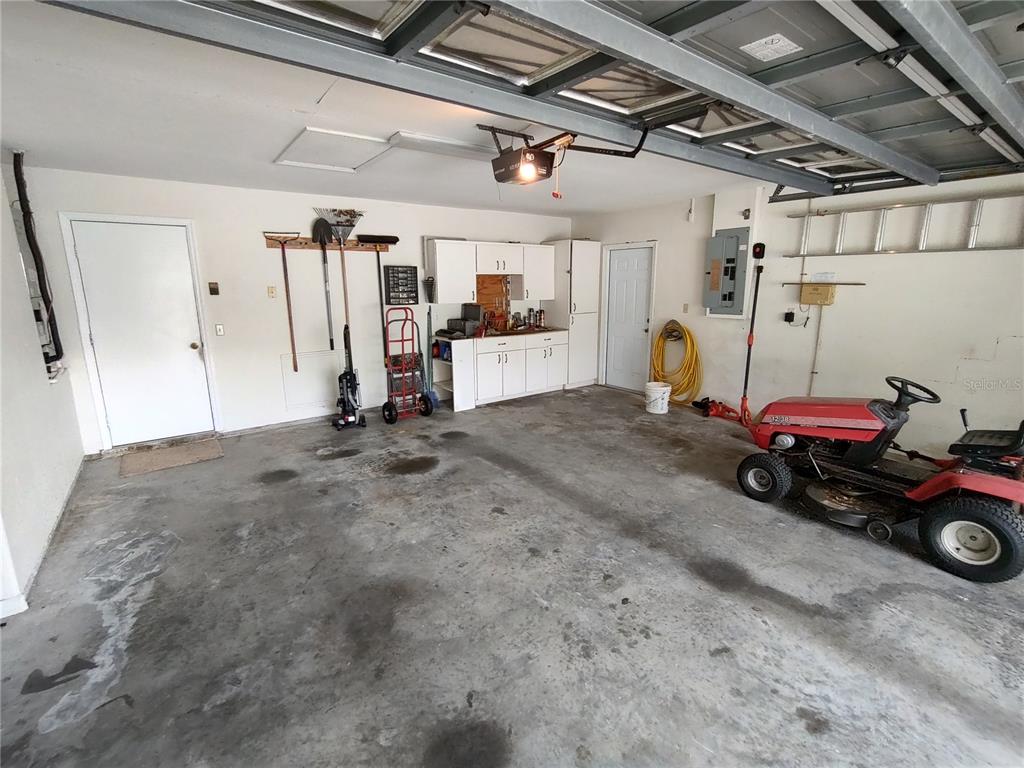 6202 Southwest 100th Loop Ocala, FL 34476 - Photo 23 of 24 a view of car garage