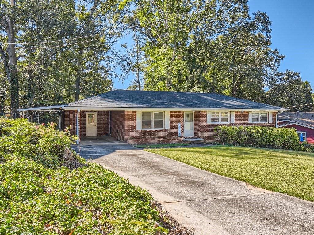4039 Tiffany Drive Decatur, GA 30035 - Photo 1 of 1 a front view of a house with a yard