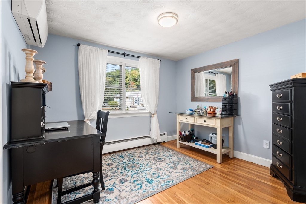 5 Albert Road Peabody, MA 01960 - Photo 16 of 39 a view of a workspace with furniture and a window