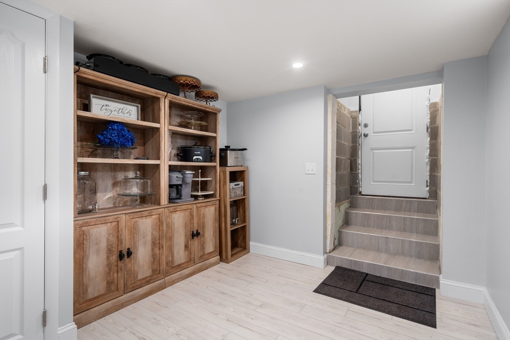 5 Albert Road Peabody, MA 01960 - Photo 26 of 39 a view of an empty room with wooden floor and a window