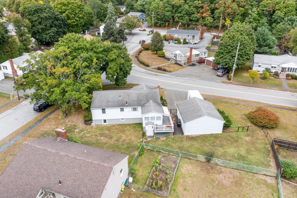 5 Albert Road Peabody, MA 01960 - Photo 37 of 39 an aerial view of a house with a swimming pool