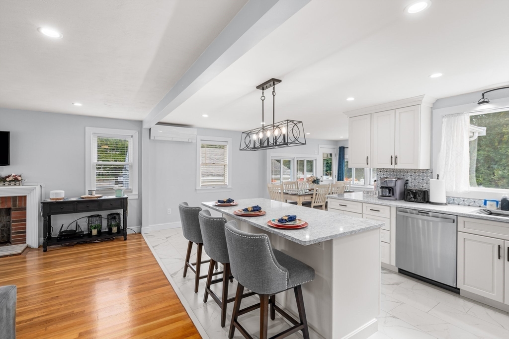 5 Albert Road Peabody, MA 01960 - Photo 6 of 39 a kitchen that has a table and chairs in it